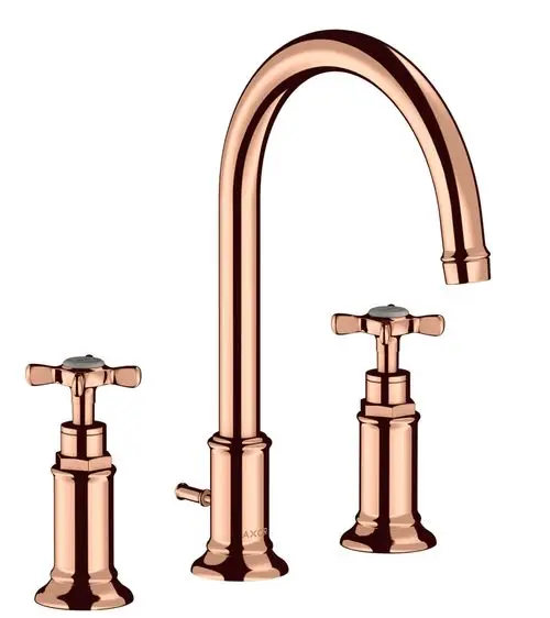 Drei Armaturen in poliertem Rotgold von AXOR mit hohem, gebogenem Wasserhahn und zwei Kreuzgriffen zur Steuerung der Wasserzufuhr.